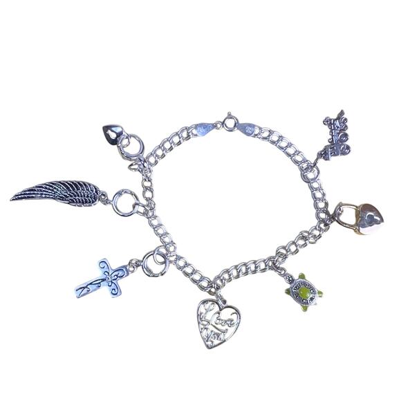 Sterling Silver Charm Bracelet with 7 charms - 7  3/4" - Picture 1 of 11